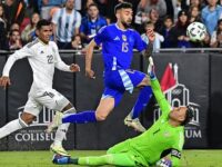 Miss of the century! Complacent Argentina star chips Costa Rica goalkeeper and waits to watch his shot cross the line… only to see it cleared by defender who dashed back