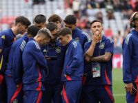 Spain stars huddle around a phone to watch compatriot Carlos Alcaraz’s dramatic French Open win over Jannik Sinner ahead of Nations League final